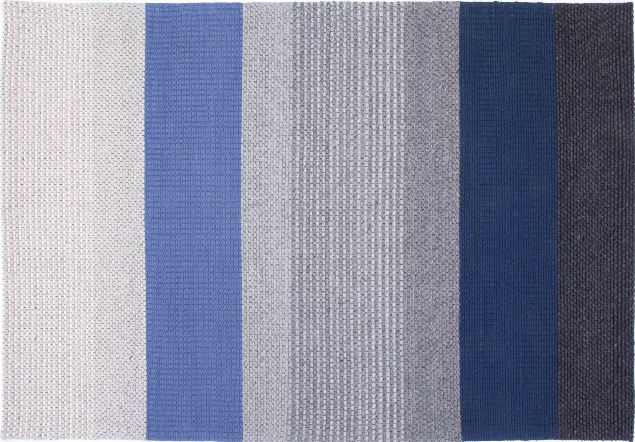 Cook Cove Area Rug in a finished interior.