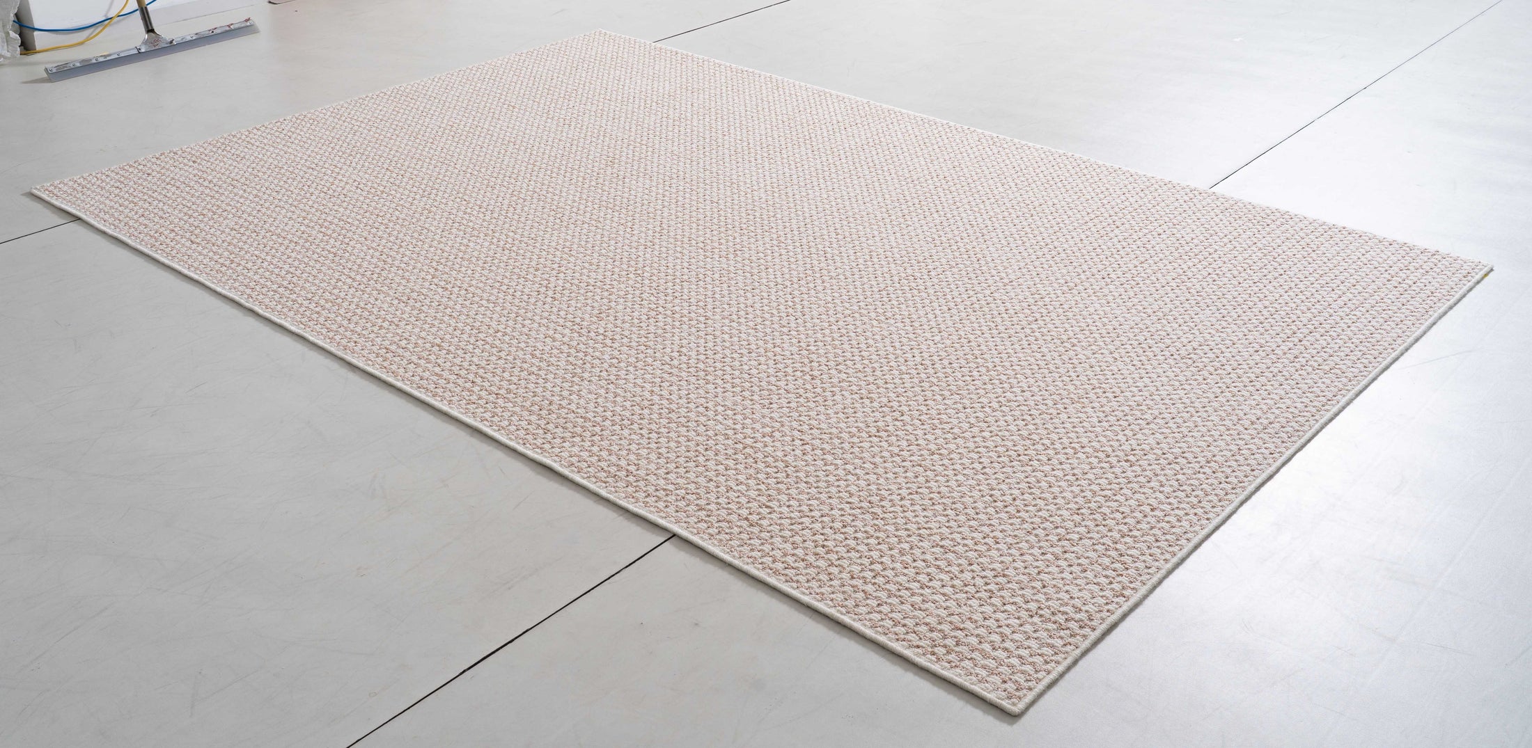 Midsummer Dawn Area Rug in a finished interior.