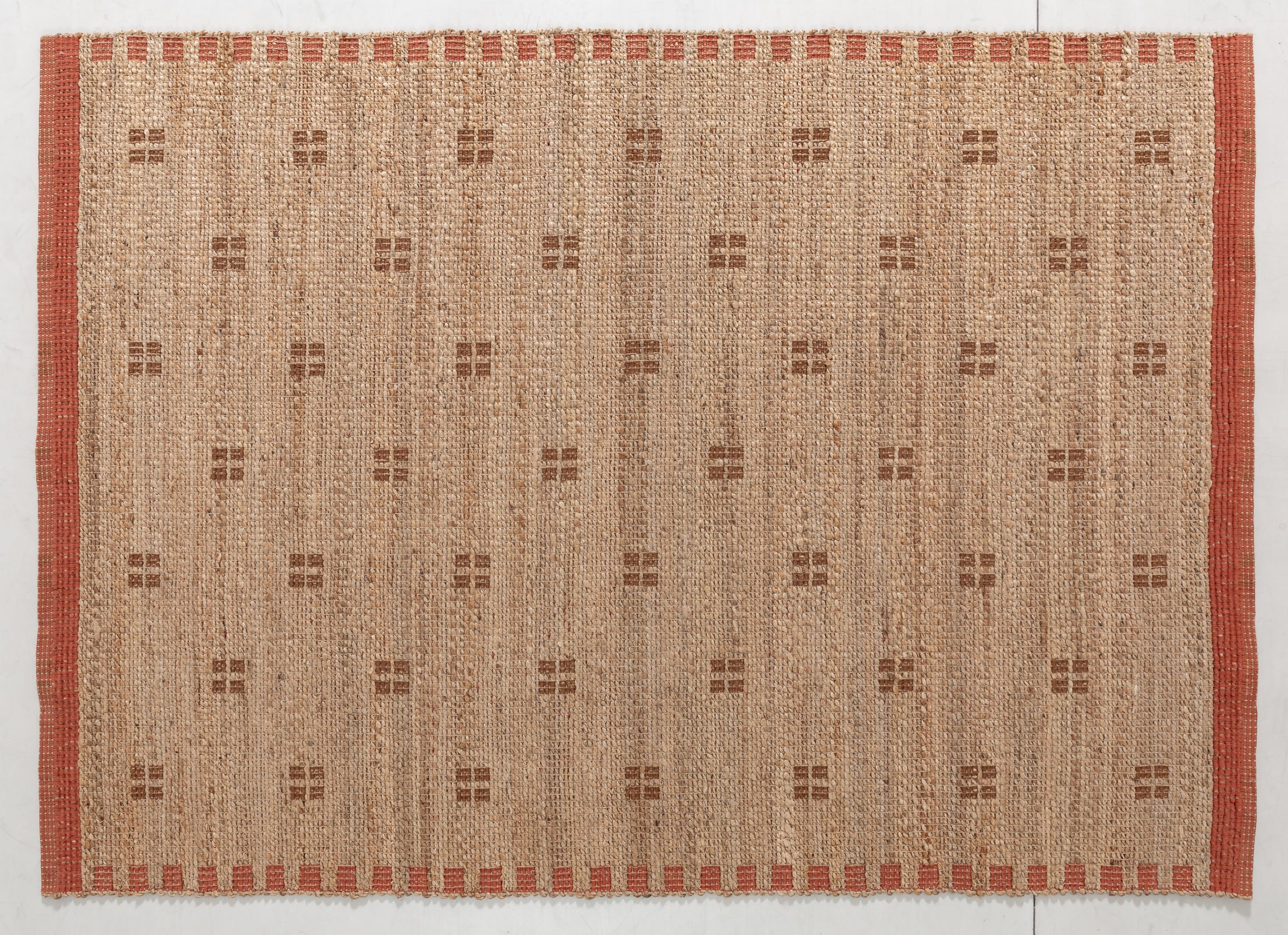 Huegem Arc Area Rug in a finished interior.