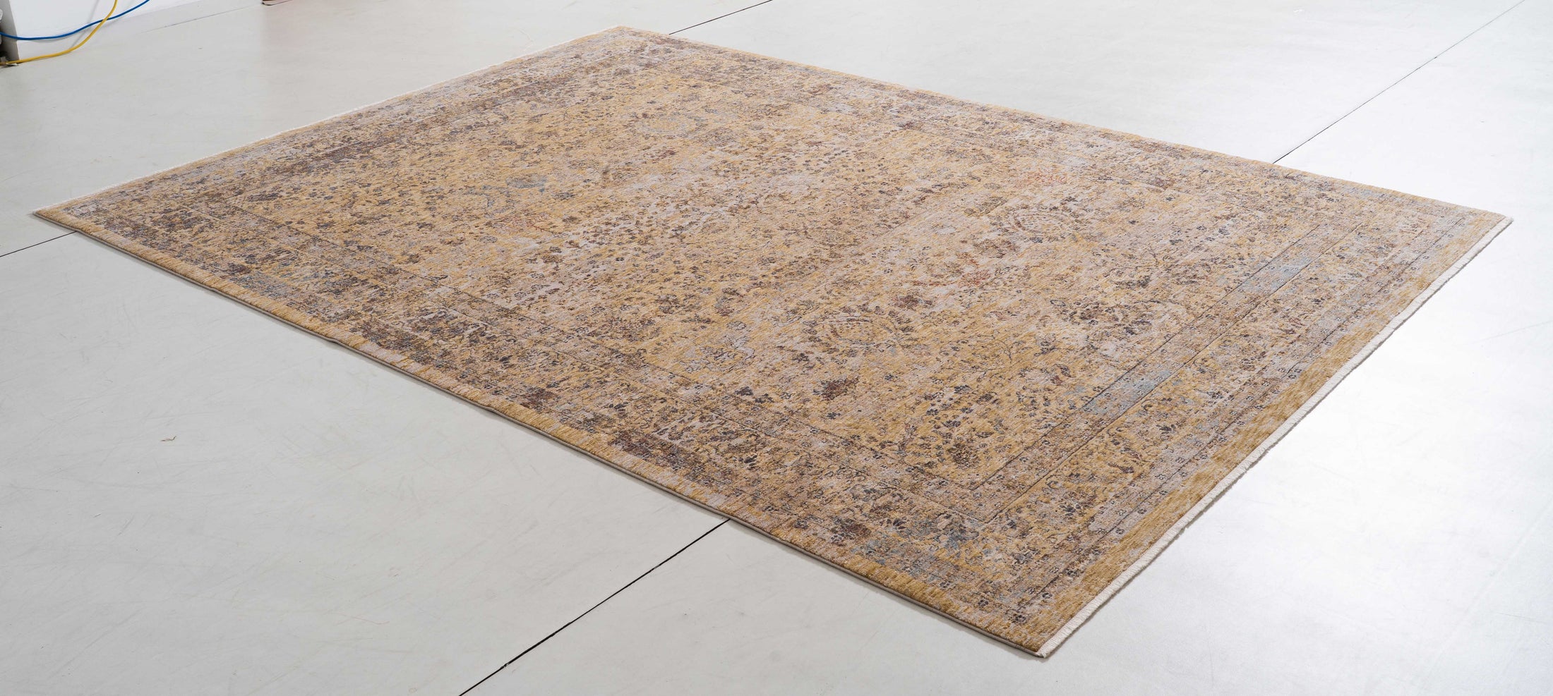 Legend Arc Area Rug in a finished interior.