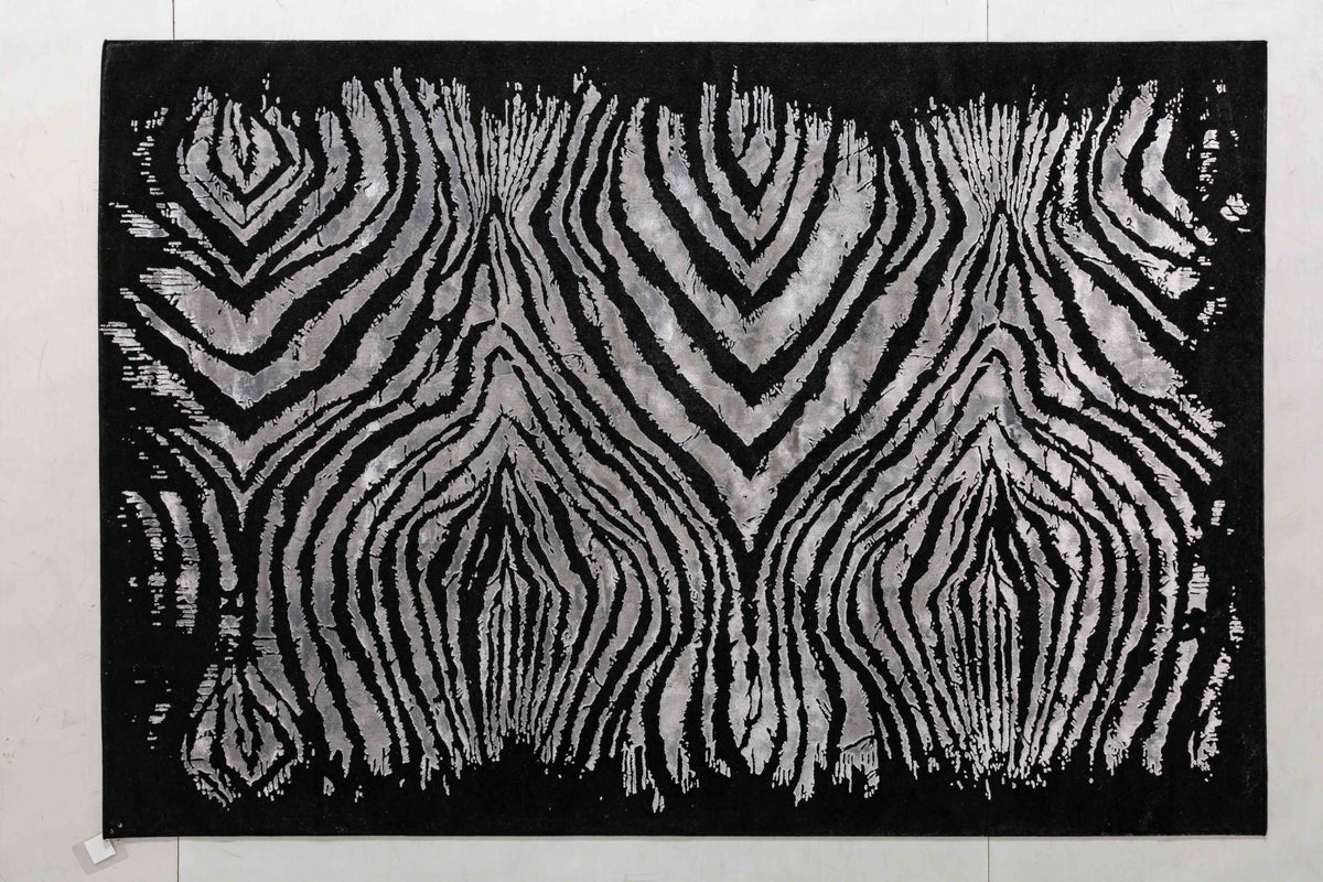 Glory Cairn Area Rug in a finished interior.