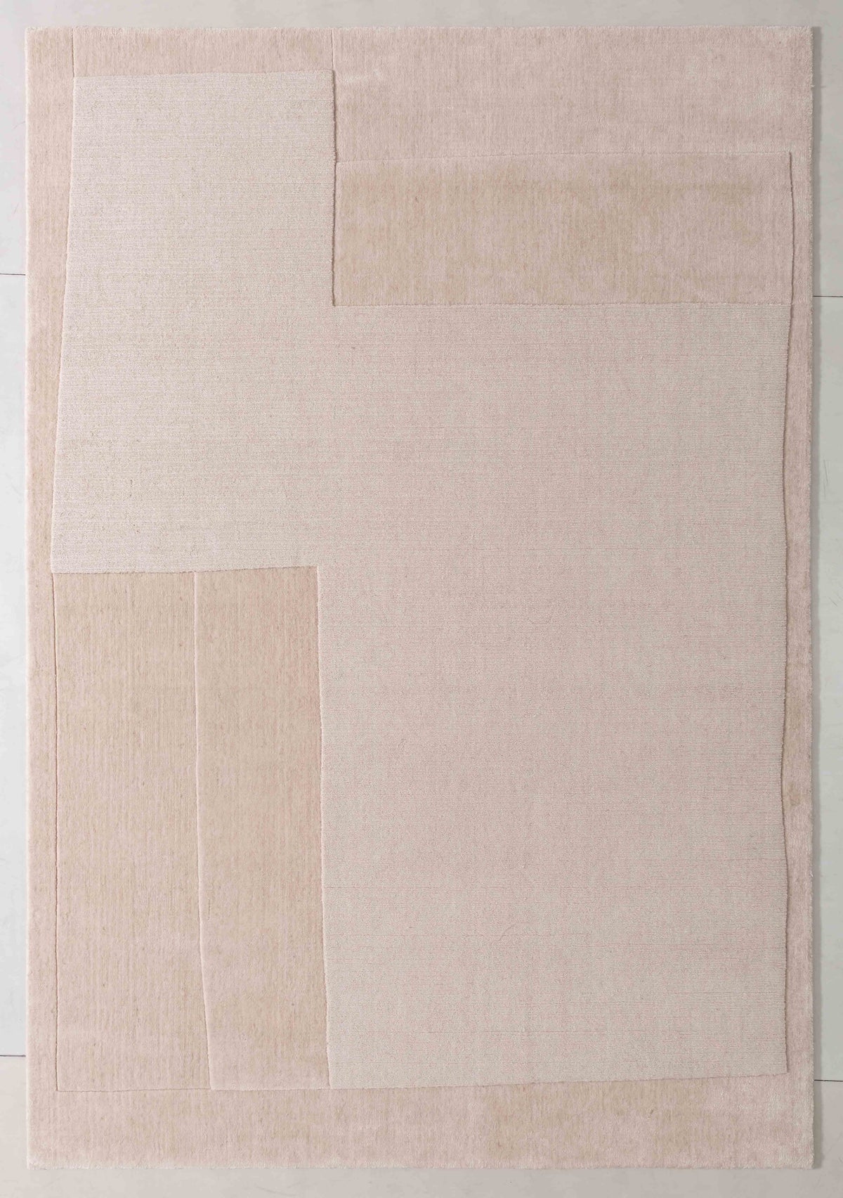 Ballet Arc Area Rug in a finished interior.