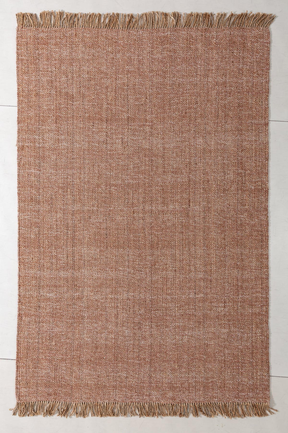 Natsuki Atlas Area Rug in a finished interior.