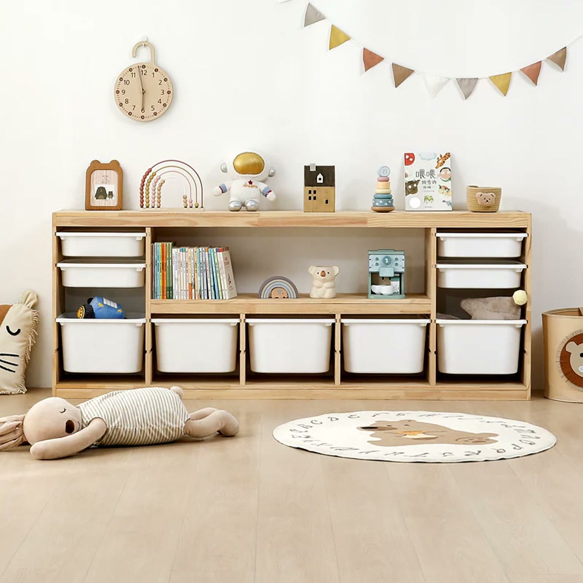 Natural pine storage cabinets arranged side by side with open shelves and removable bins