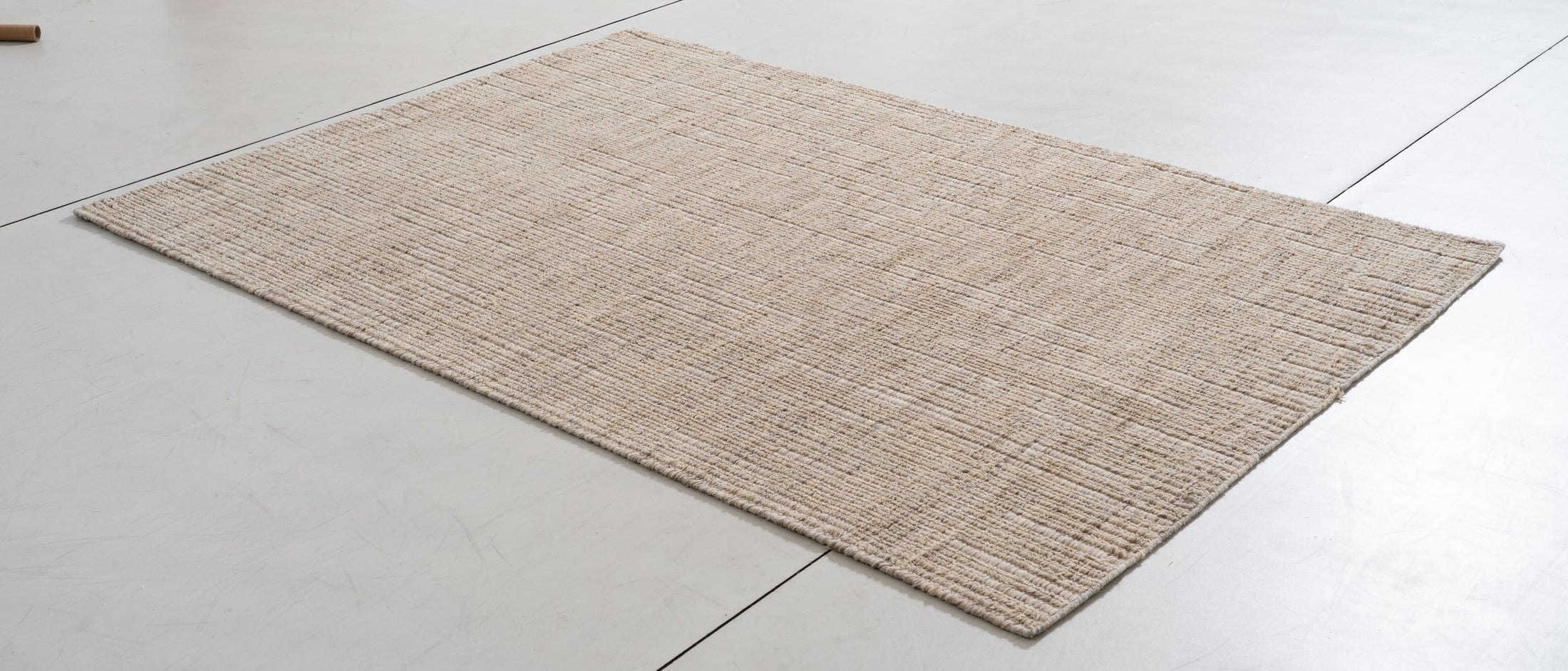 Piedmont Bloom Area Rug in a finished interior.
