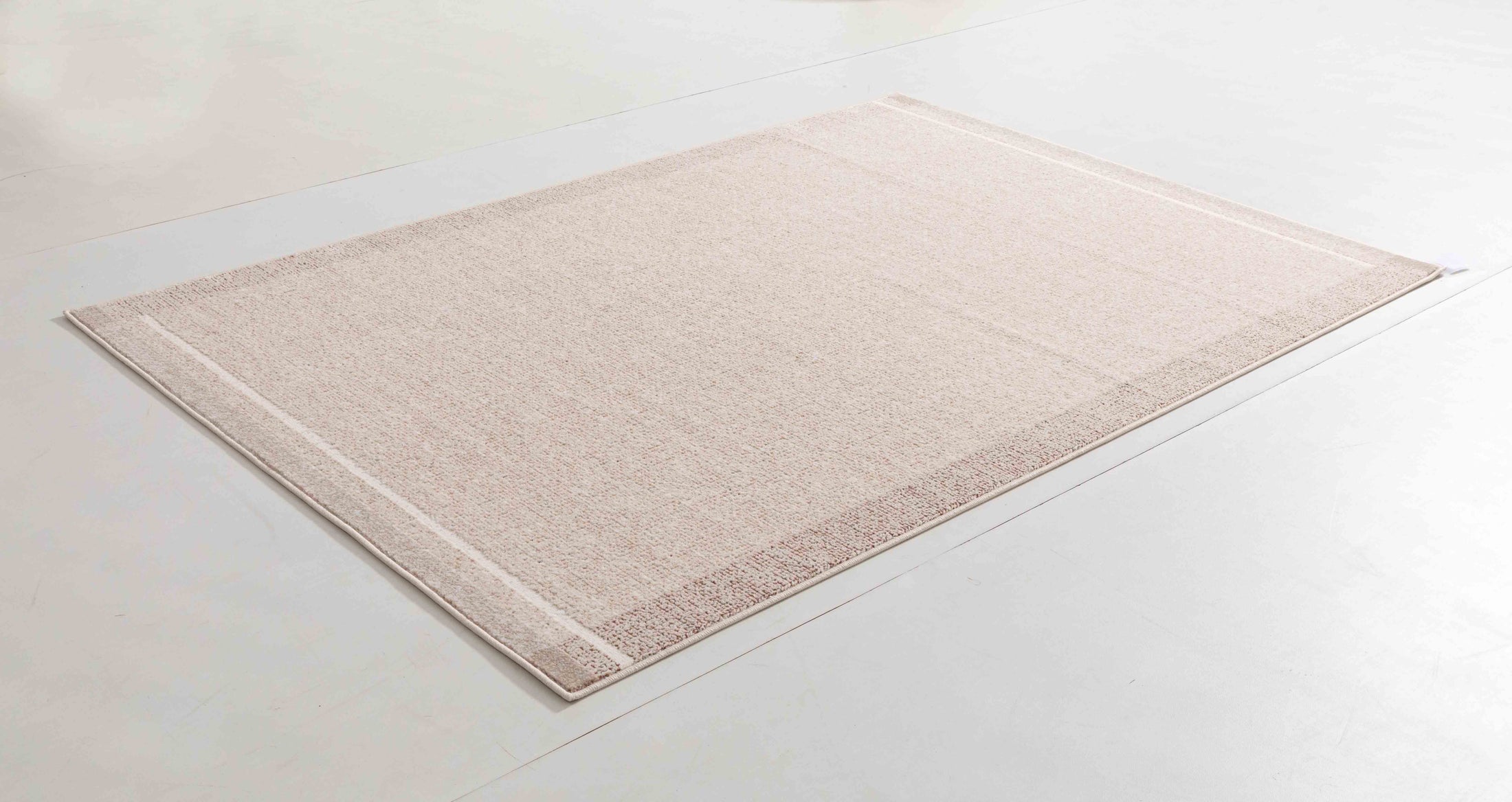 Locke Atlas Area Rug in a finished interior.