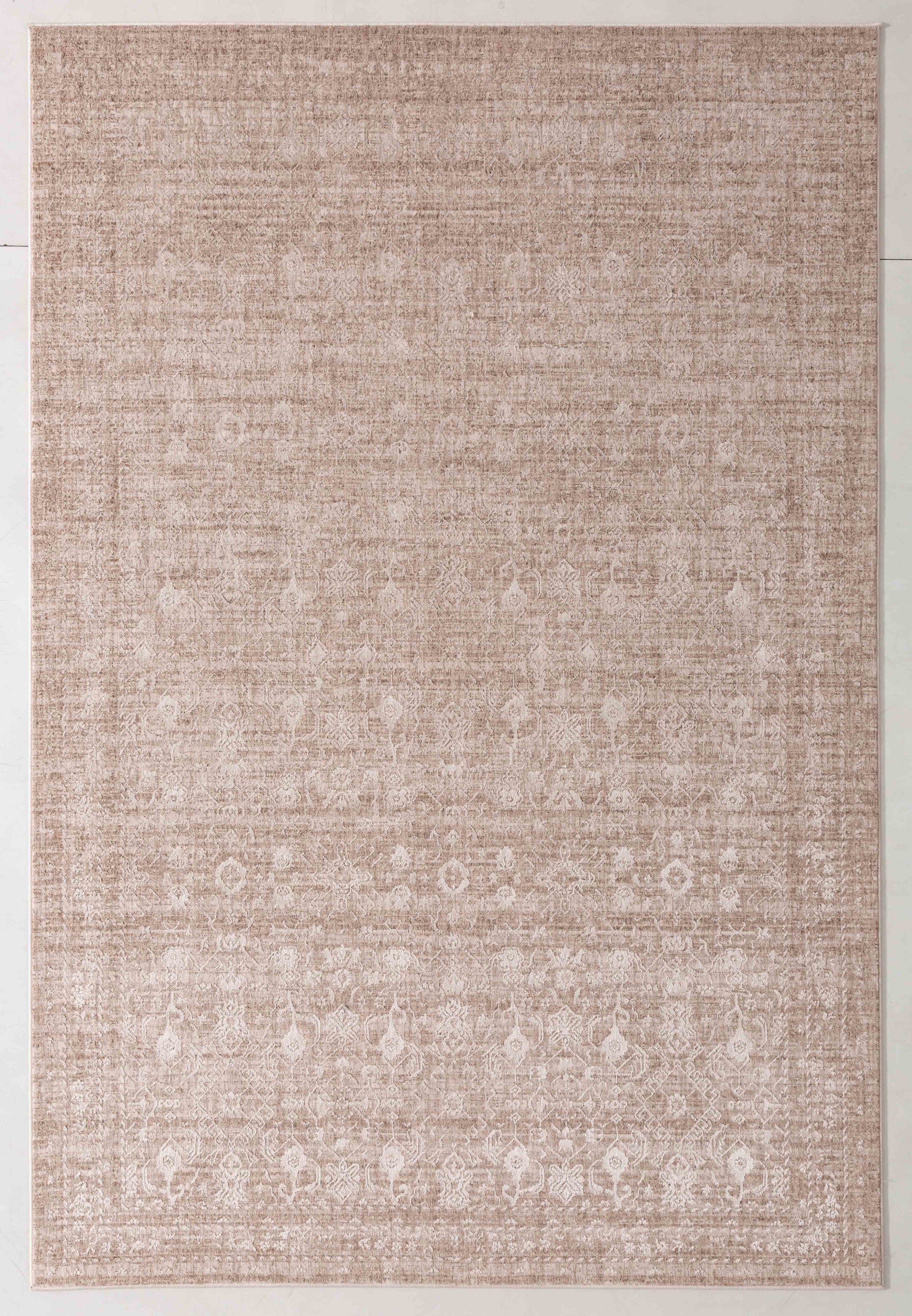 Painter Ember Area Rug in a finished interior.