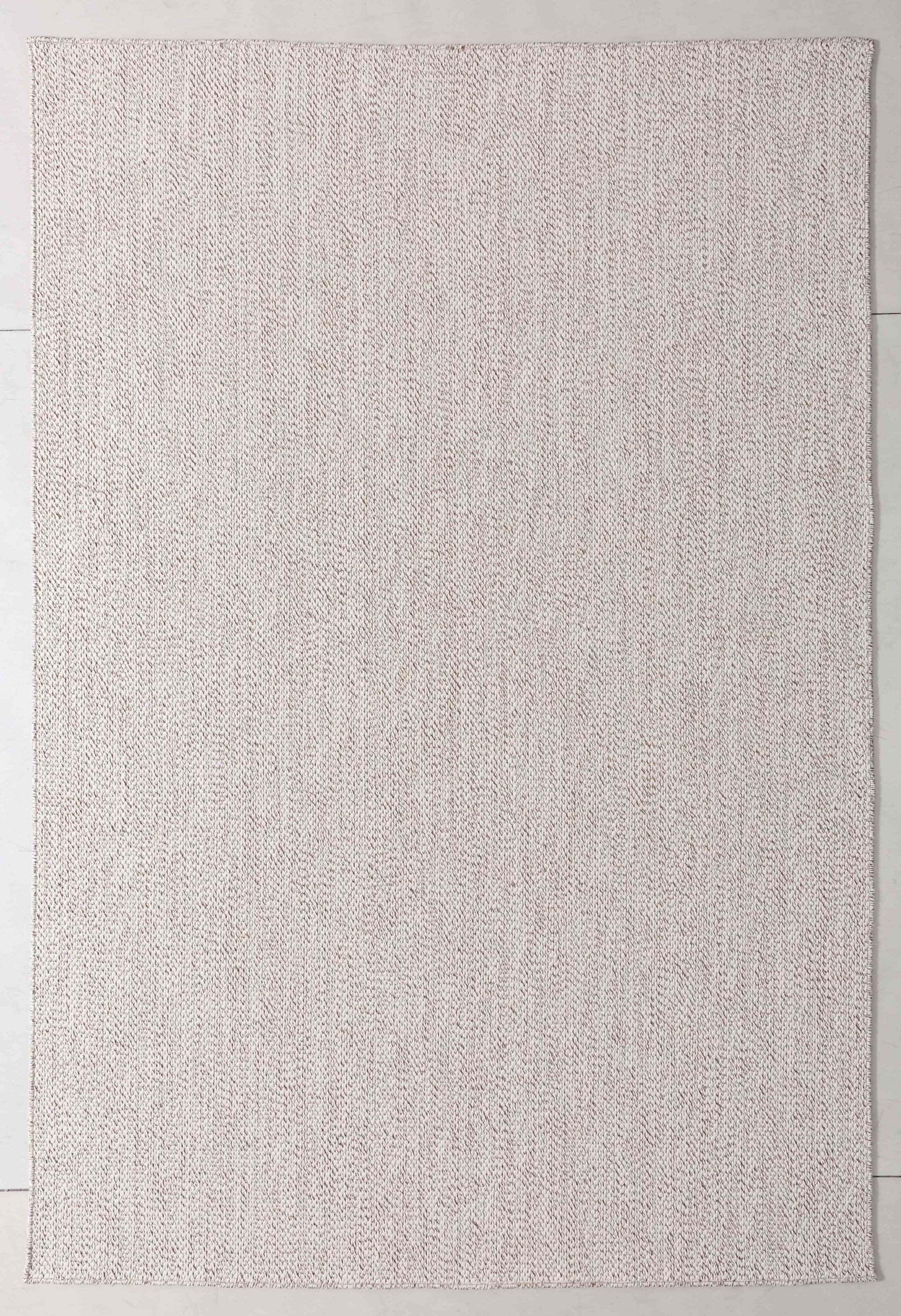 Luster Arbor Area Rug in a finished interior.