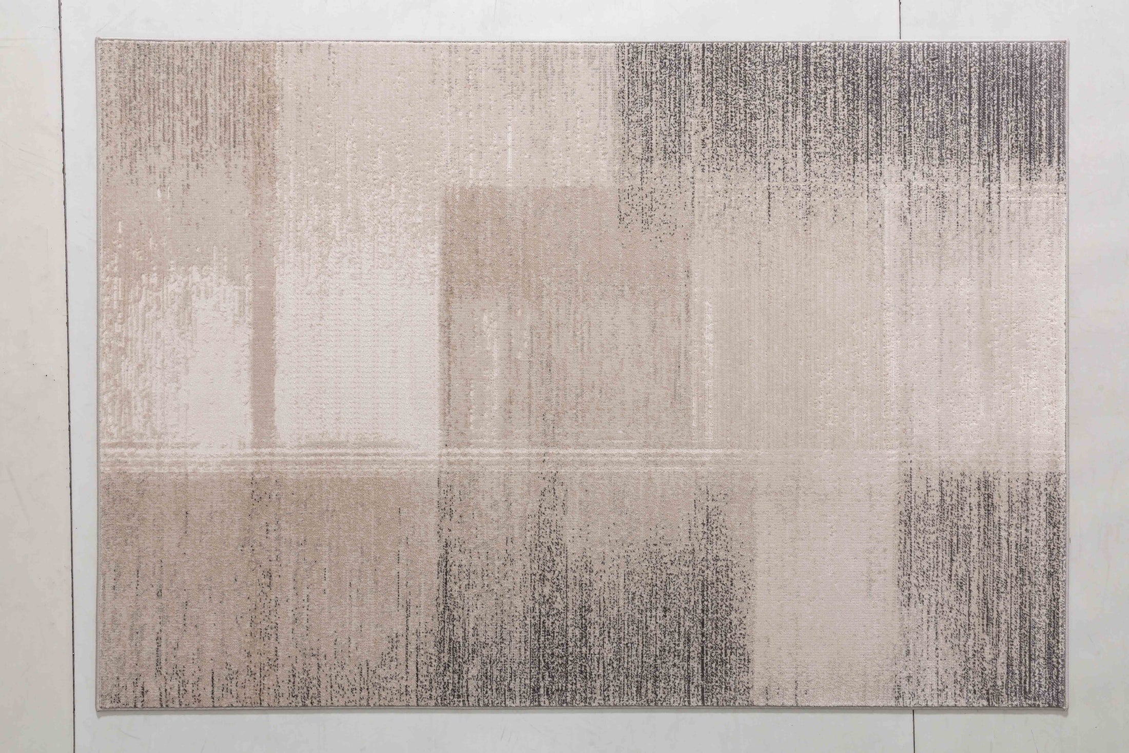 Whisper Grove Area Rug in a finished interior.