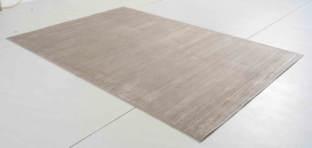 Glory Bloom Area Rug in a finished interior.