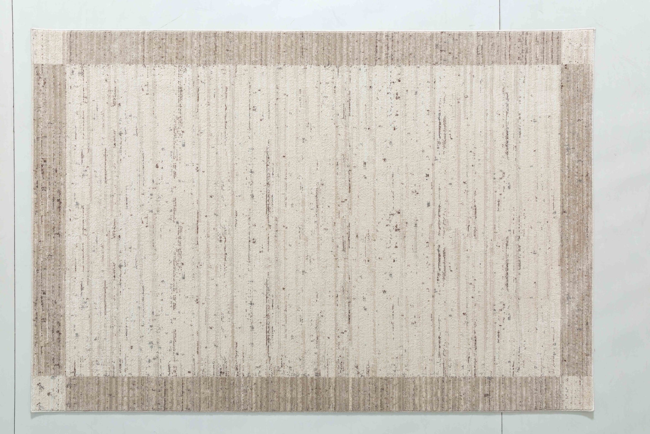 Natural Dawn Area Rug in a finished interior.