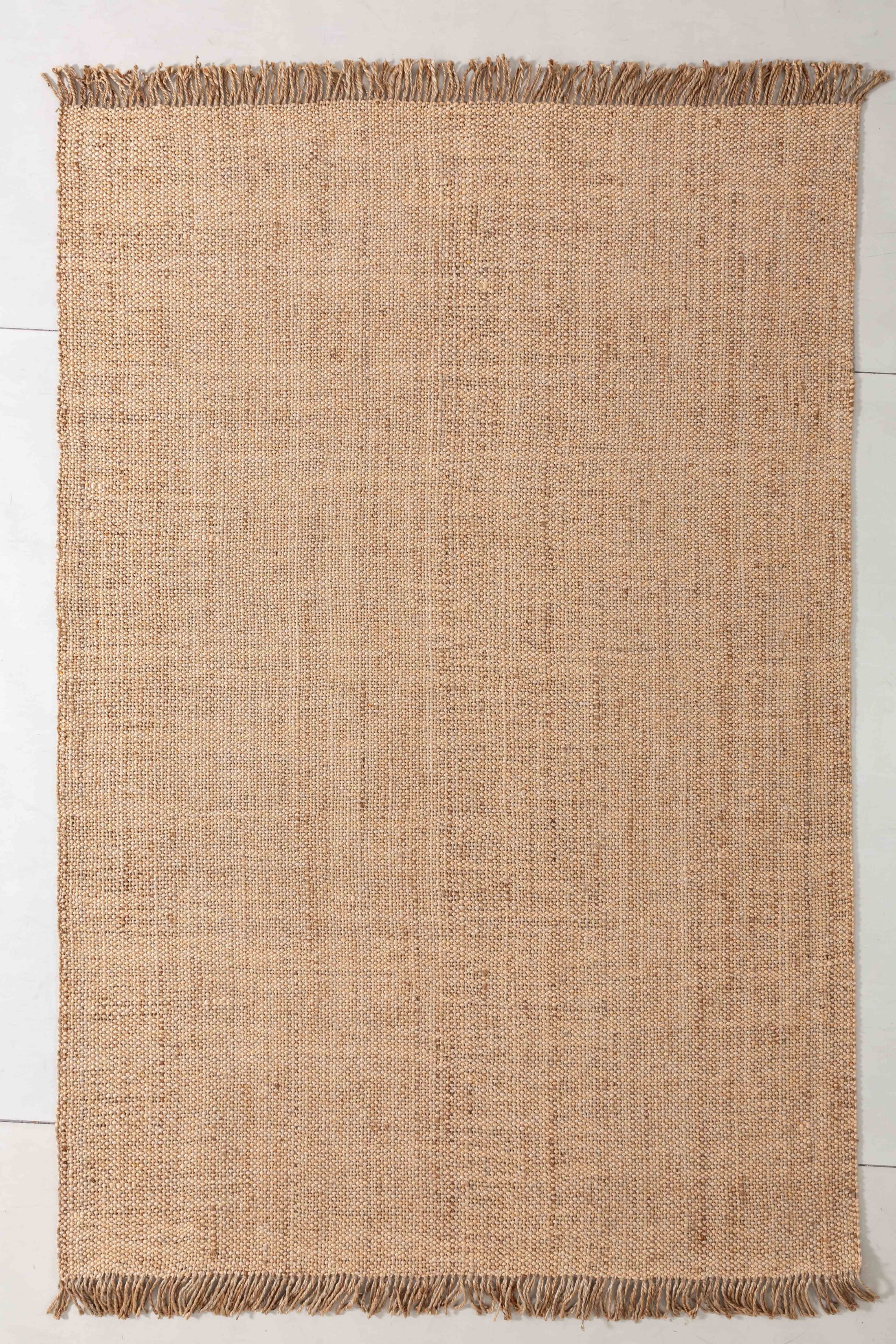 Natsuki Arc Area Rug in a finished interior.