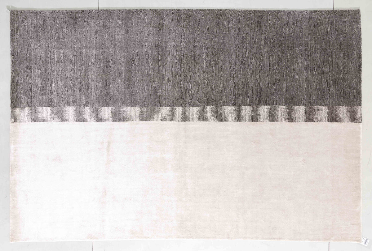 Symphony Arc Area Rug in a finished interior.