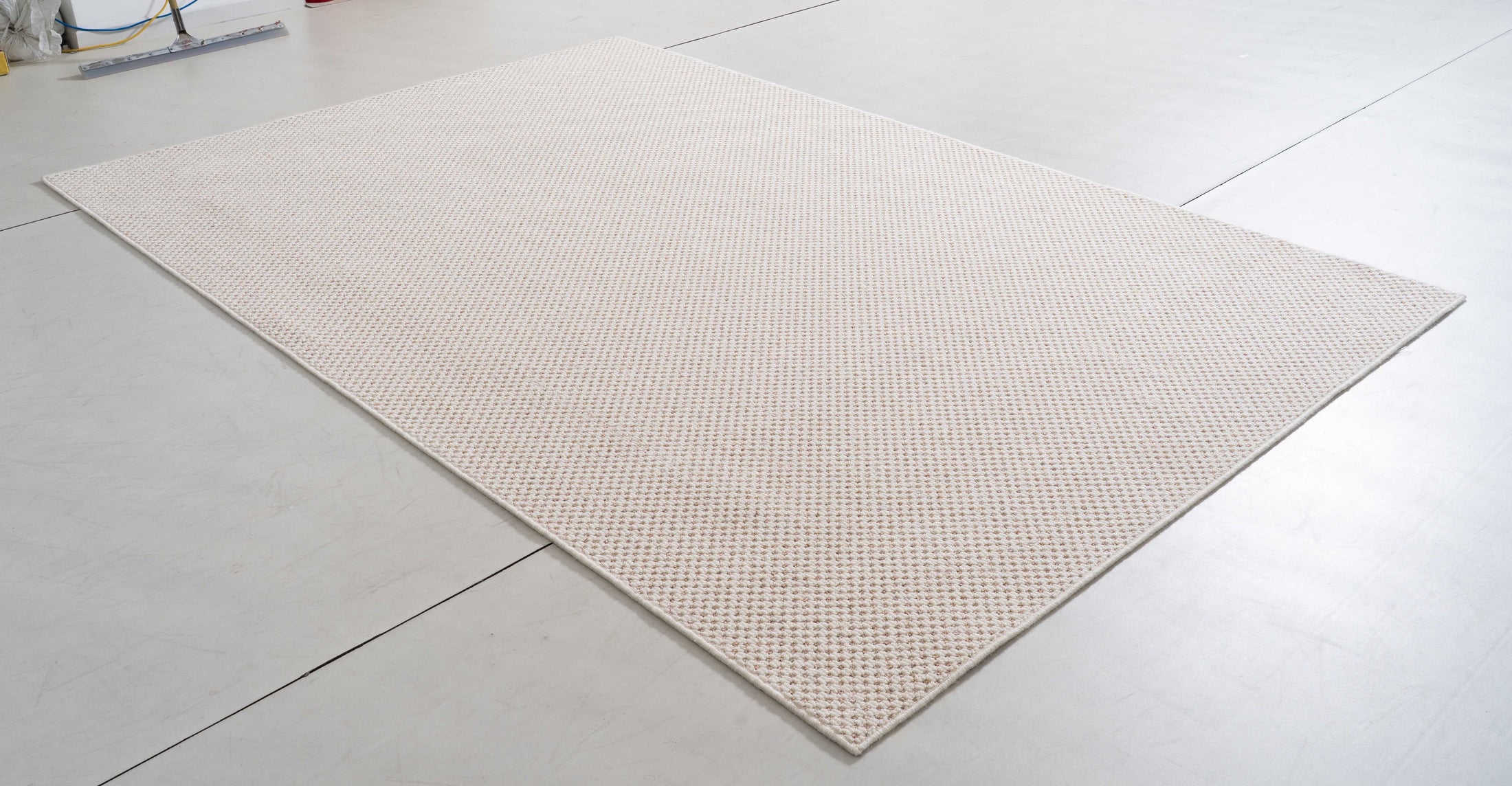 Midsummer Cairn Area Rug in a finished interior.