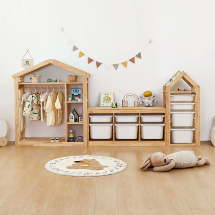  House-shaped clothes rack alongside a three-column cabinet and a tall bin tower