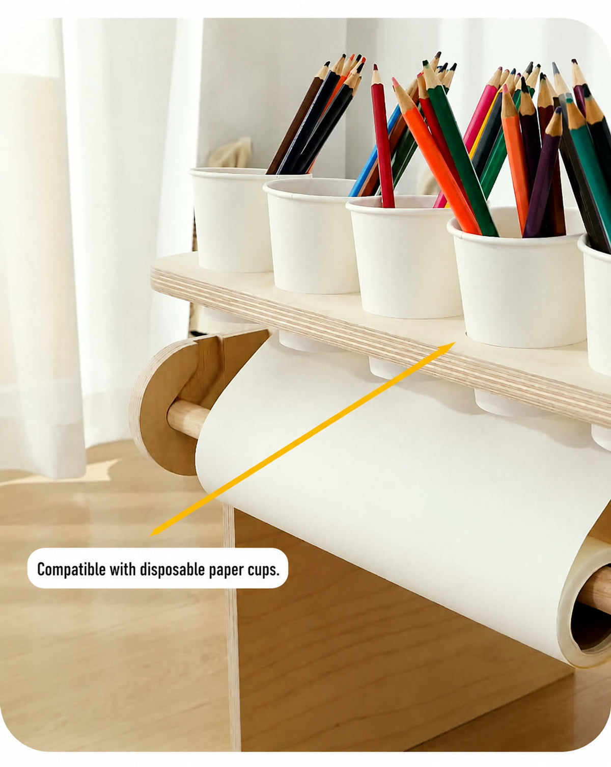  Cup-holder openings filled with drawing supplies