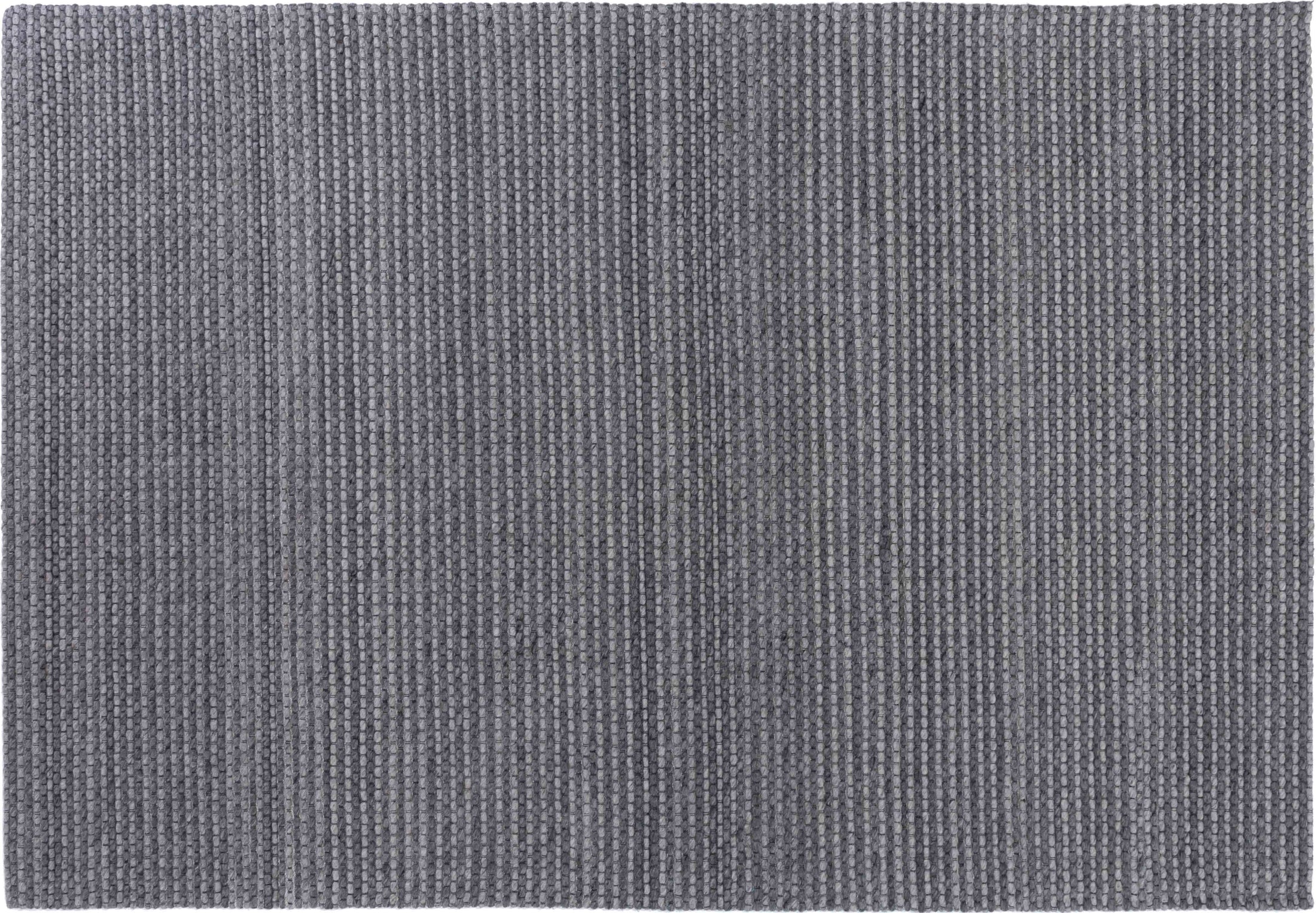 Cook Atlas Area Rug in a finished interior.