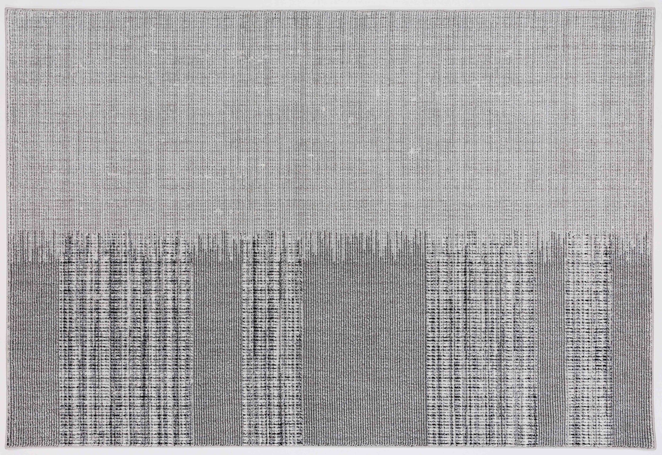 Hillside Ember Area Rug in a finished interior.