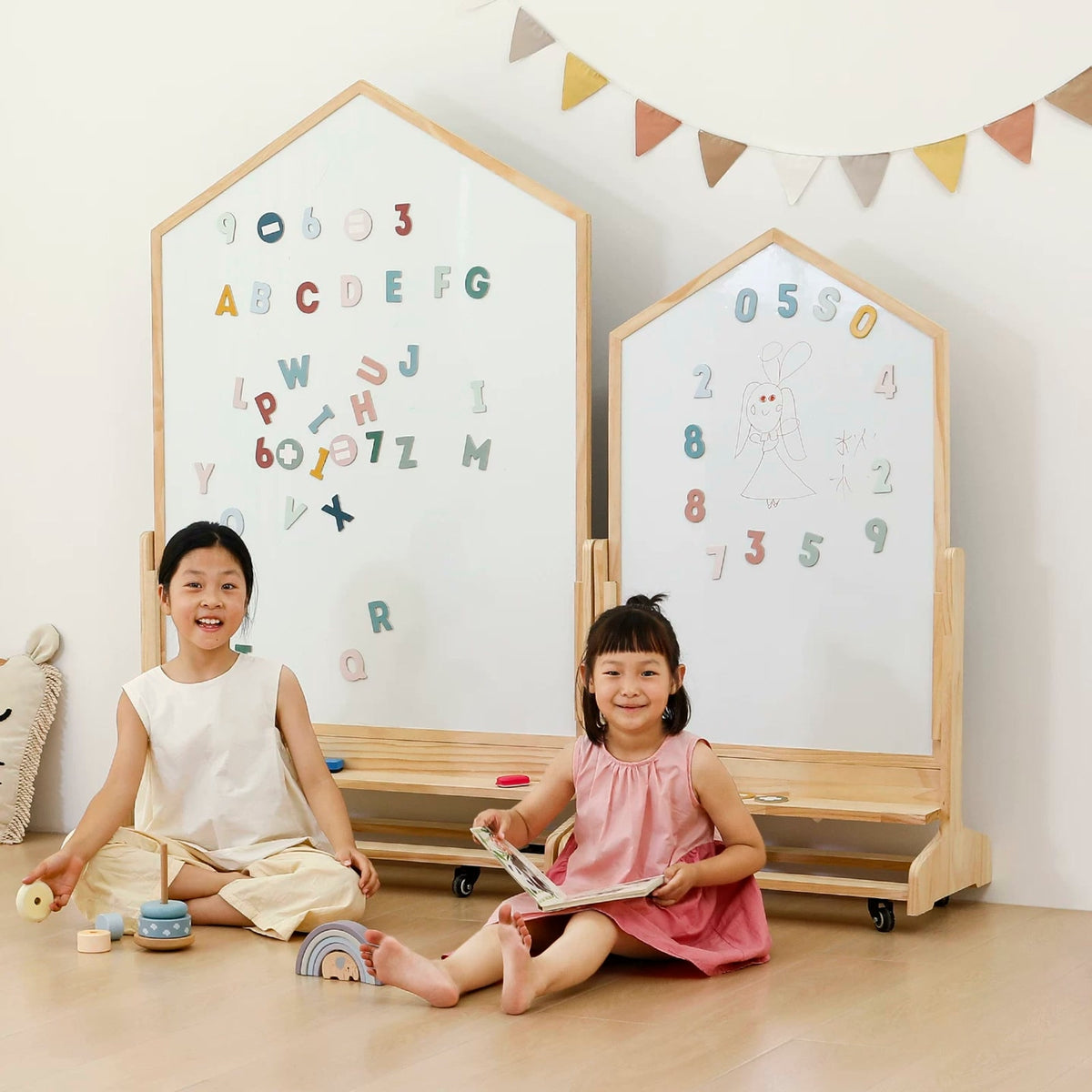  Two house-shaped rolling boards shown together to compare sizes, not a two-board set