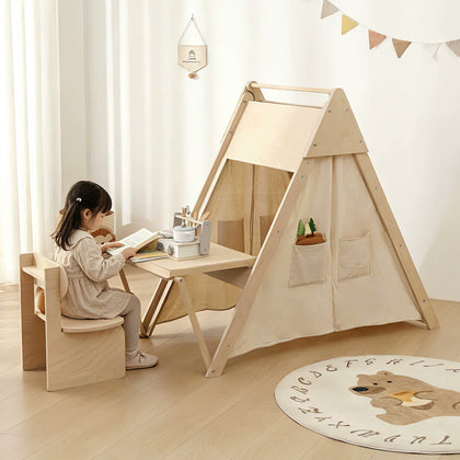  Child seated at the open desk with the optional matching chair