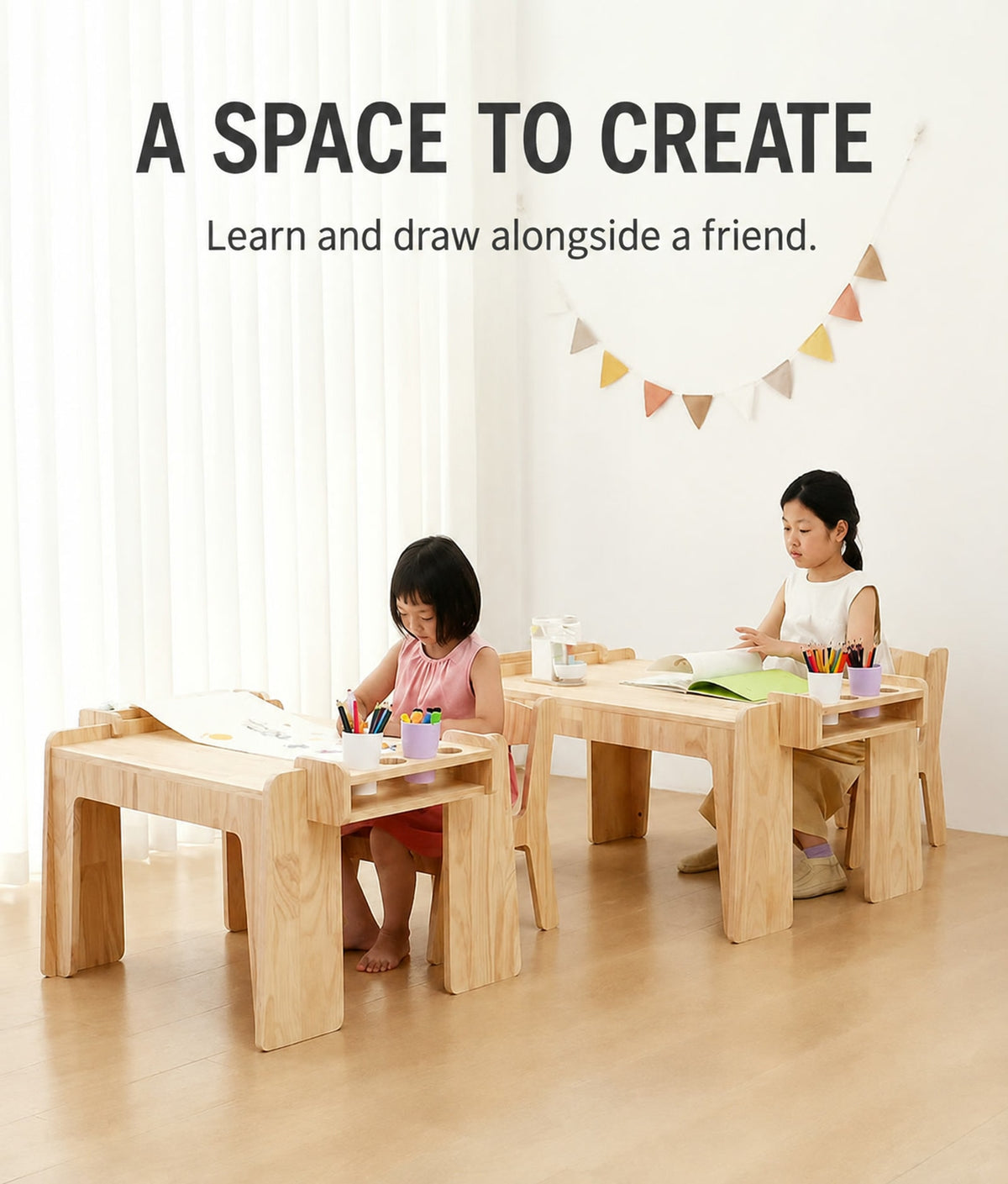  Two children working at separately sized pine desks
