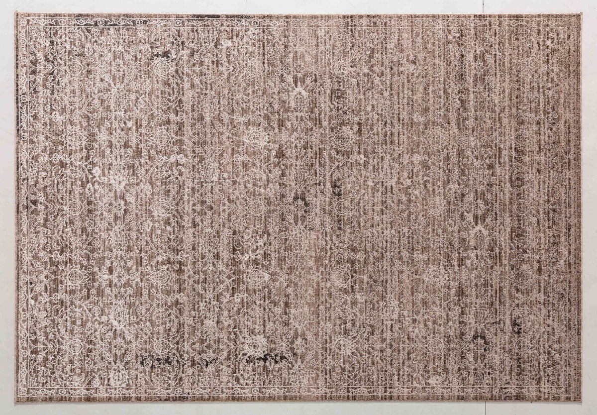 Painter Dawn Area Rug in a finished interior.
