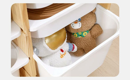 Pull-out plastic bin resting in grooved wooden supports