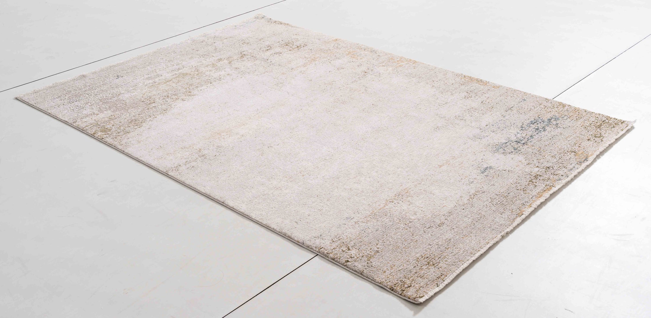 Infinitude Dawn Area Rug in a finished interior.