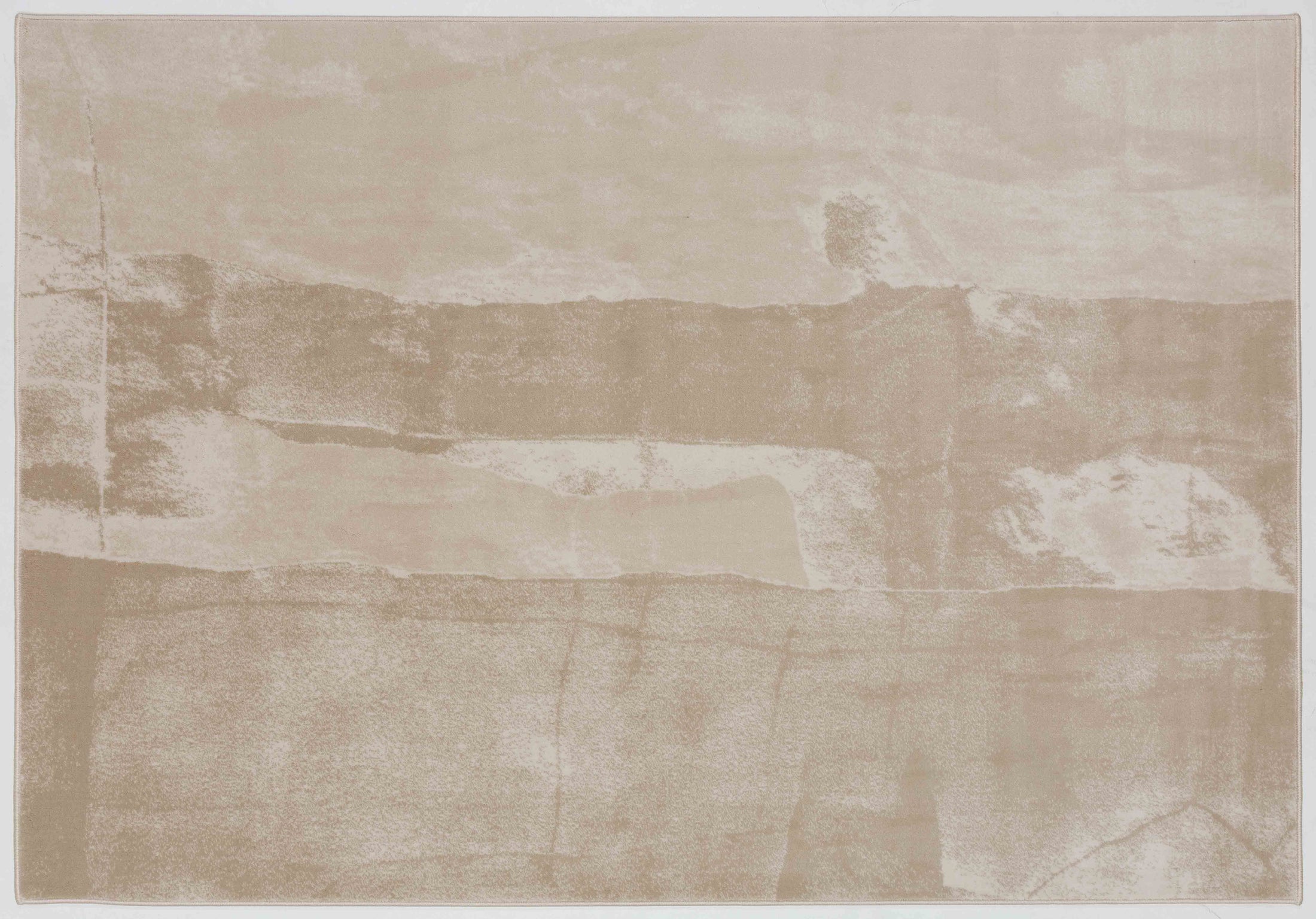 Whisper Dune Area Rug in a finished interior.