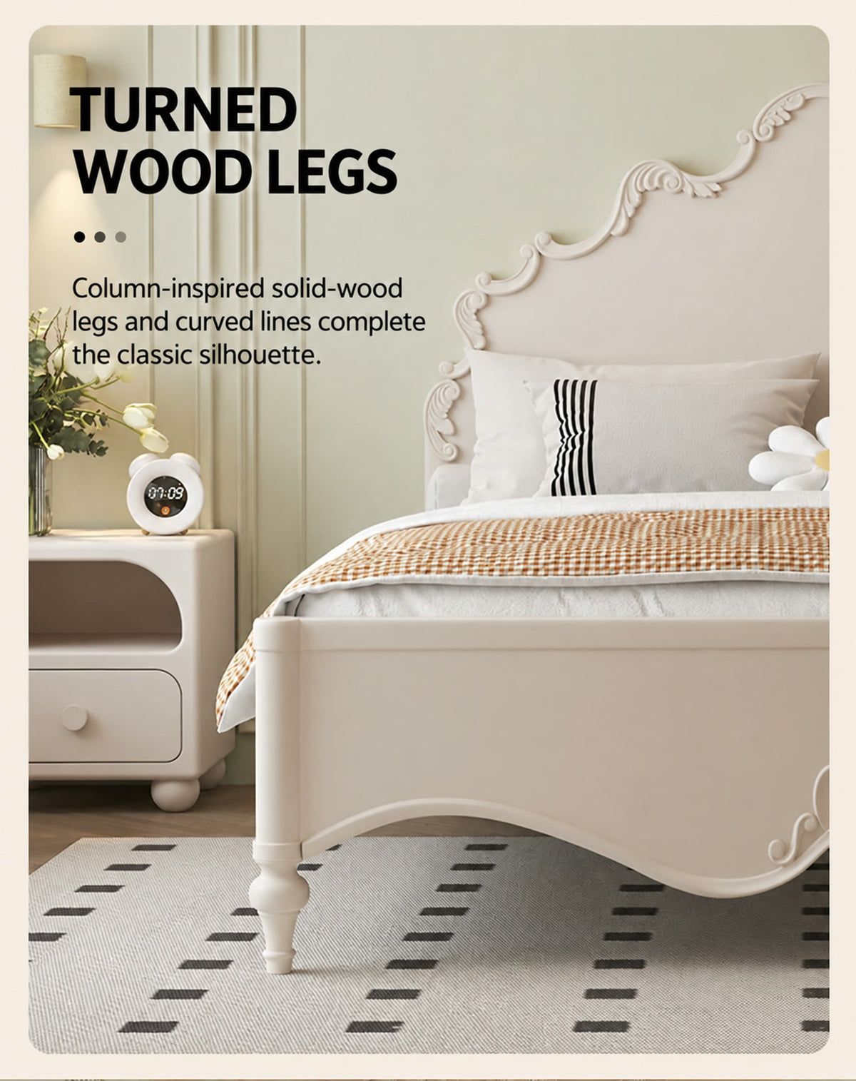  Column-inspired turned legs beneath the cream-white bed frame.
