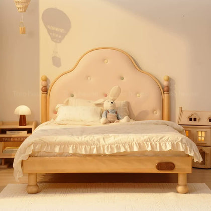  Candy button upholstered birch bed with scalloped headboard and rounded feet