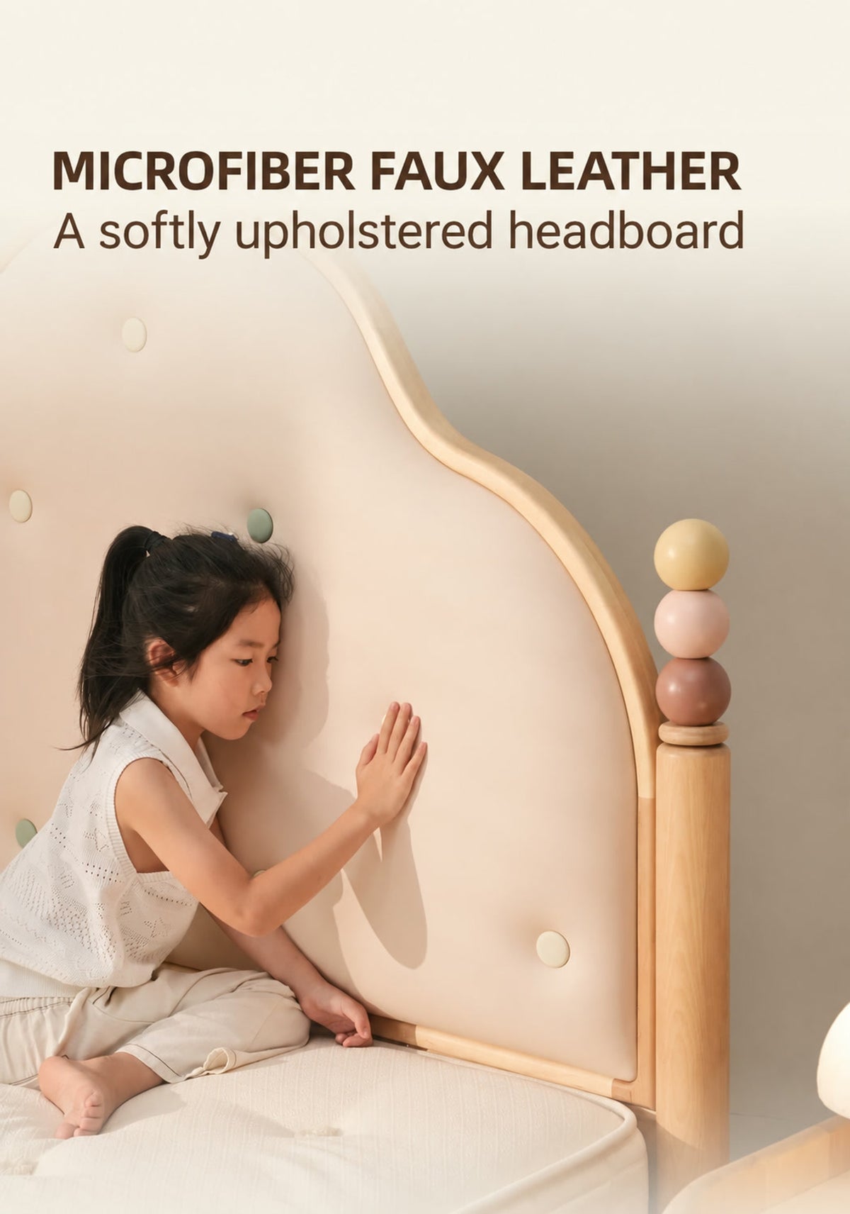  Scalloped microfiber faux-leather headboard with pastel buttons