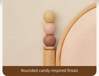  Three pastel wooden balls on the headboard post