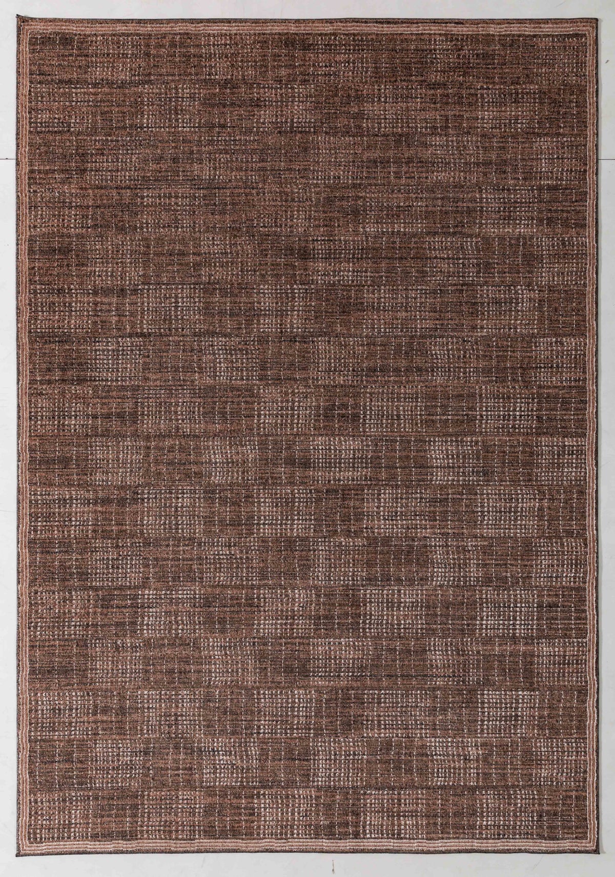 Painter Atlas Area Rug in a finished interior.