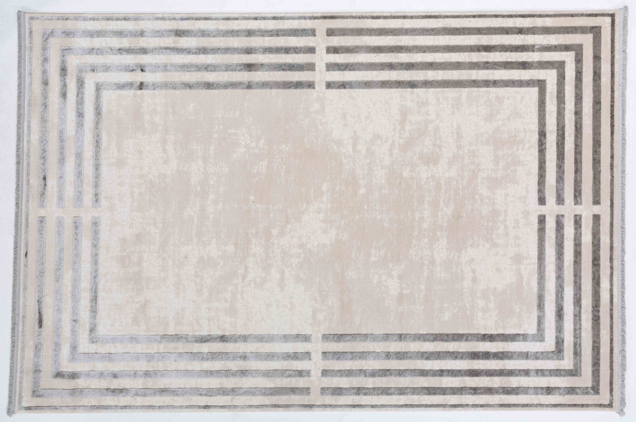 Taboo Dawn Area Rug in a finished interior.