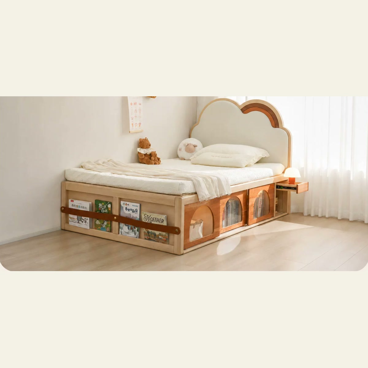 Natural birch storage bed with cloud-and-rainbow headboard, sliding doors and footboard book rack.