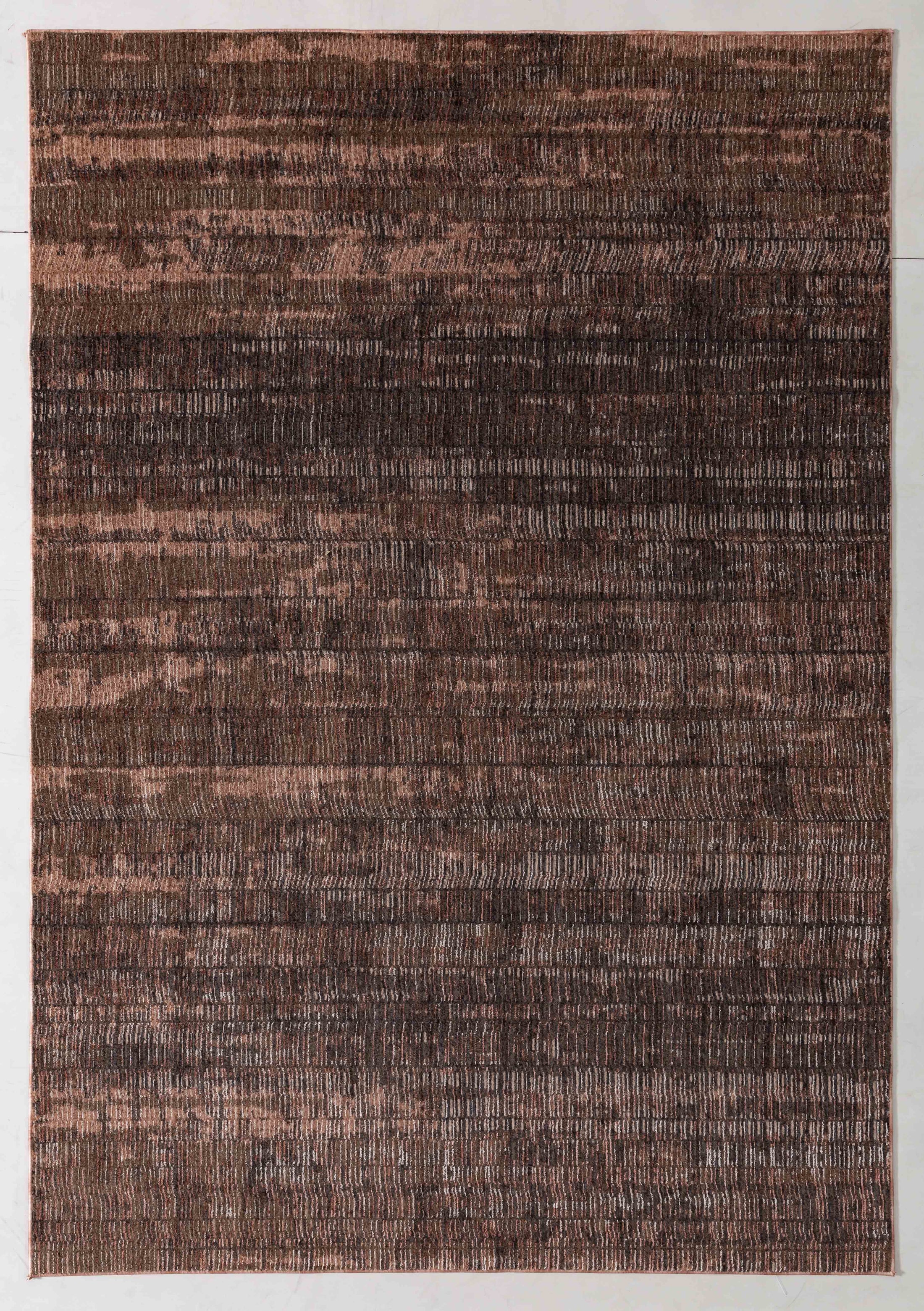 Painter Bloom Area Rug in a finished interior.