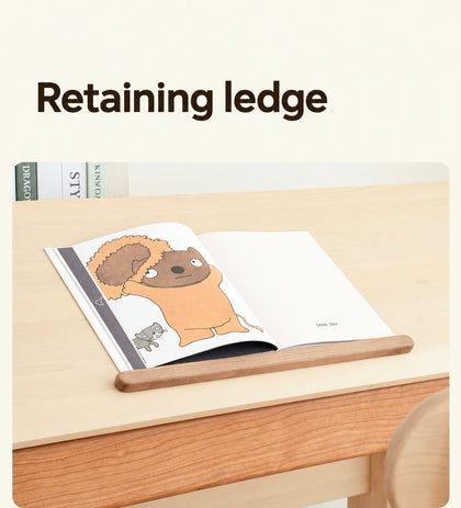  Removable wood retaining ledge supporting an open book
