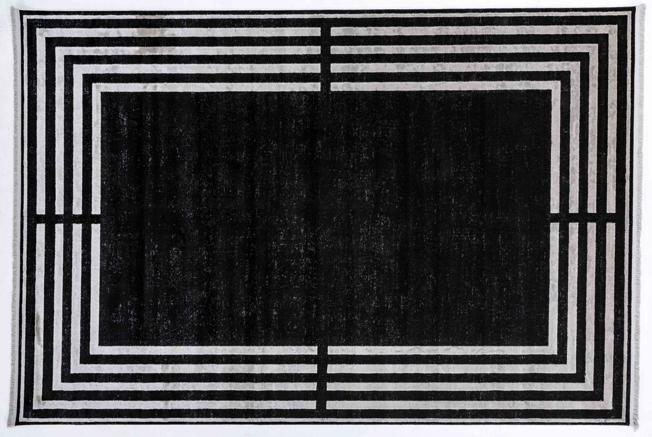 Taboo Cove Area Rug in a finished interior.