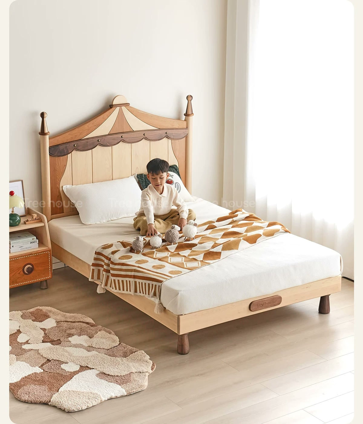  Angled view of the circus bed in a styled bedroom