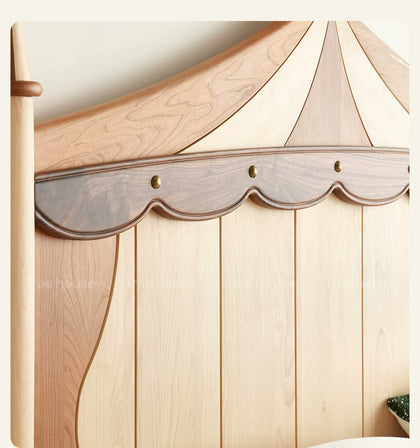  Carved curtain motif with scalloped trim and metal studs