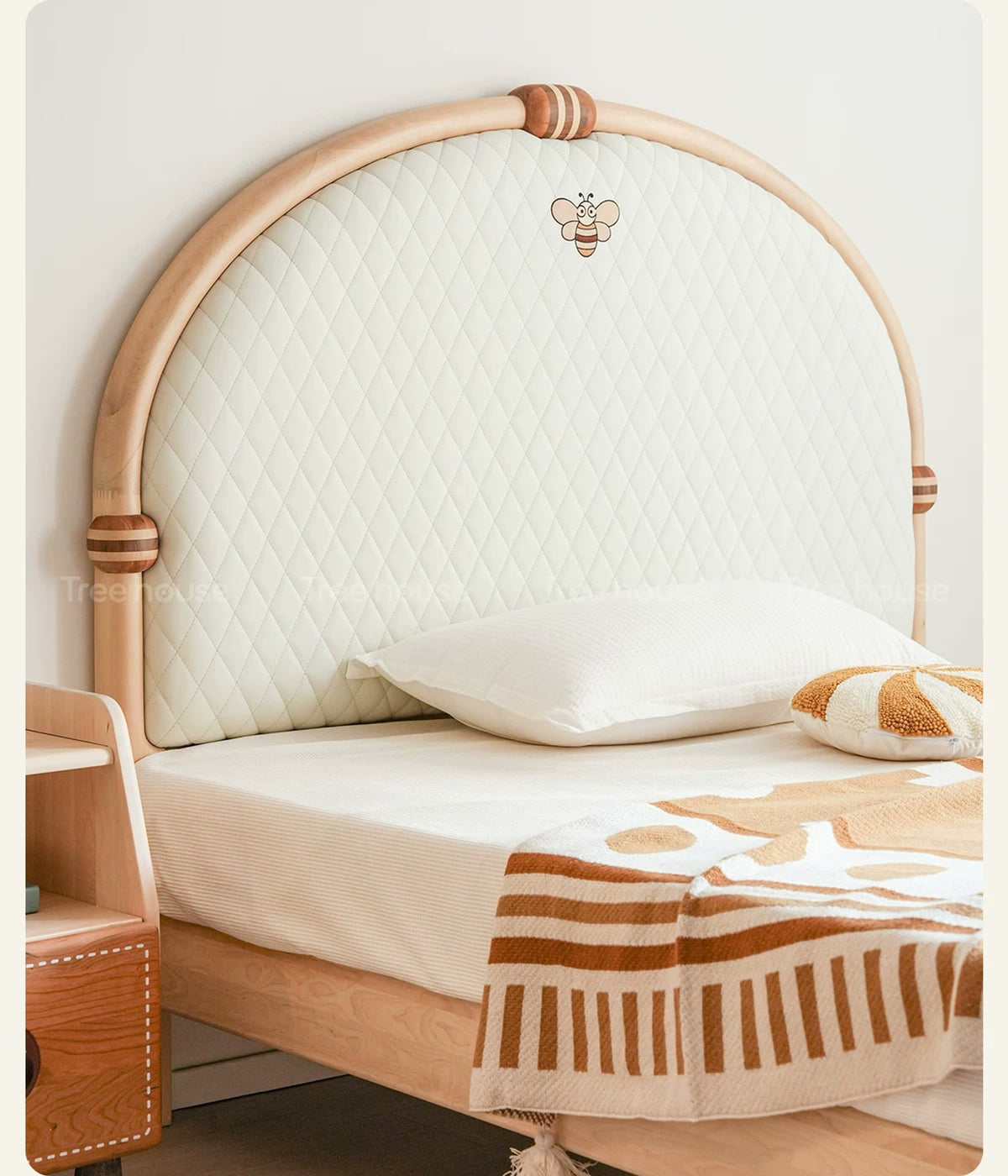  Angled view of the padded headboard and wood surround