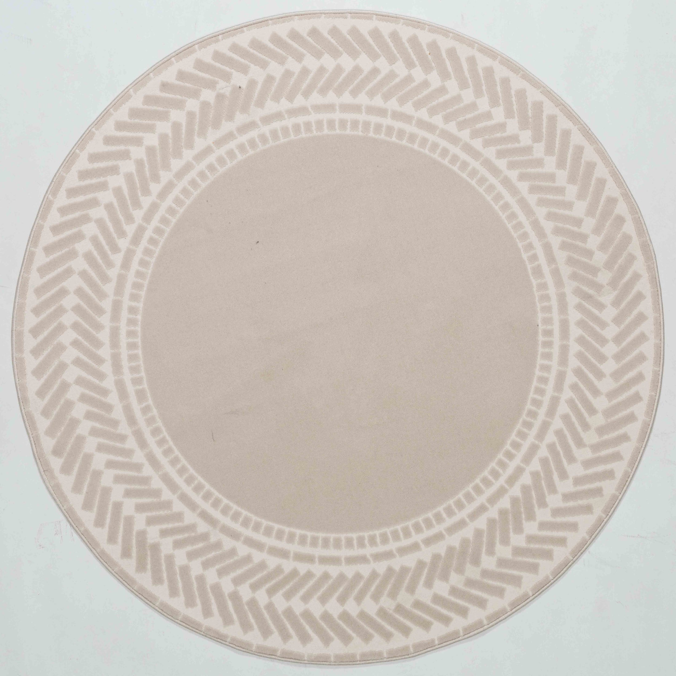 Whisper Bloom Area Rug in a finished interior.