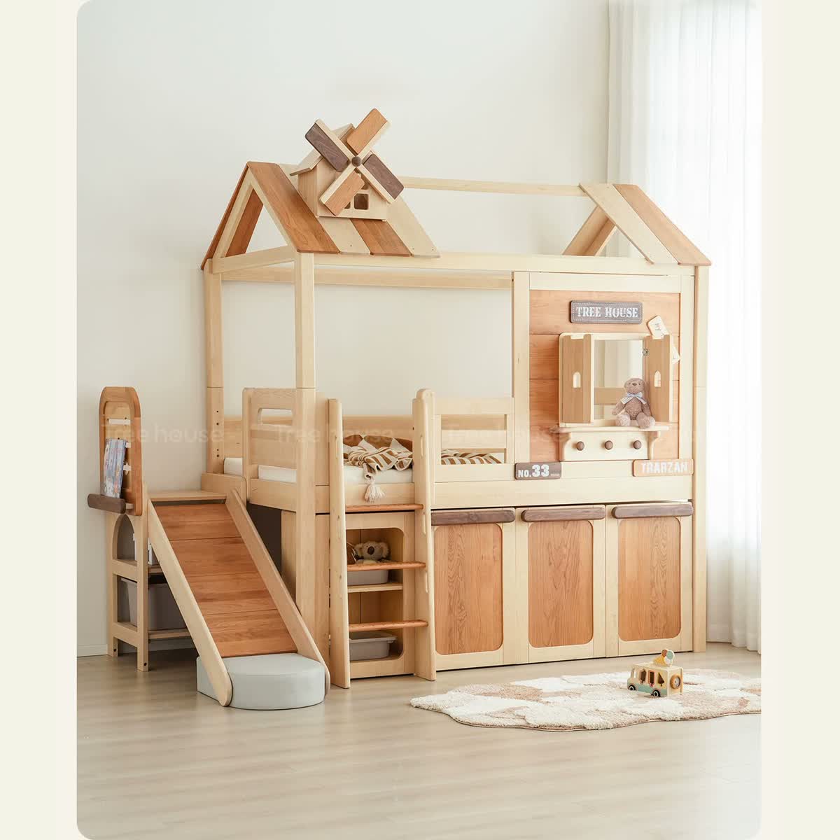 Windmill cottage bed styled with separately available slide and under-bed modules.