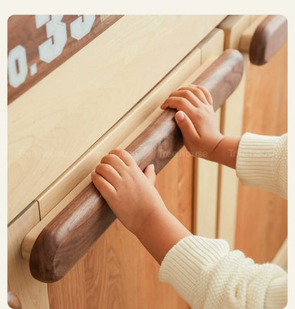  Contrasting rounded wood handle on a pull-out module.