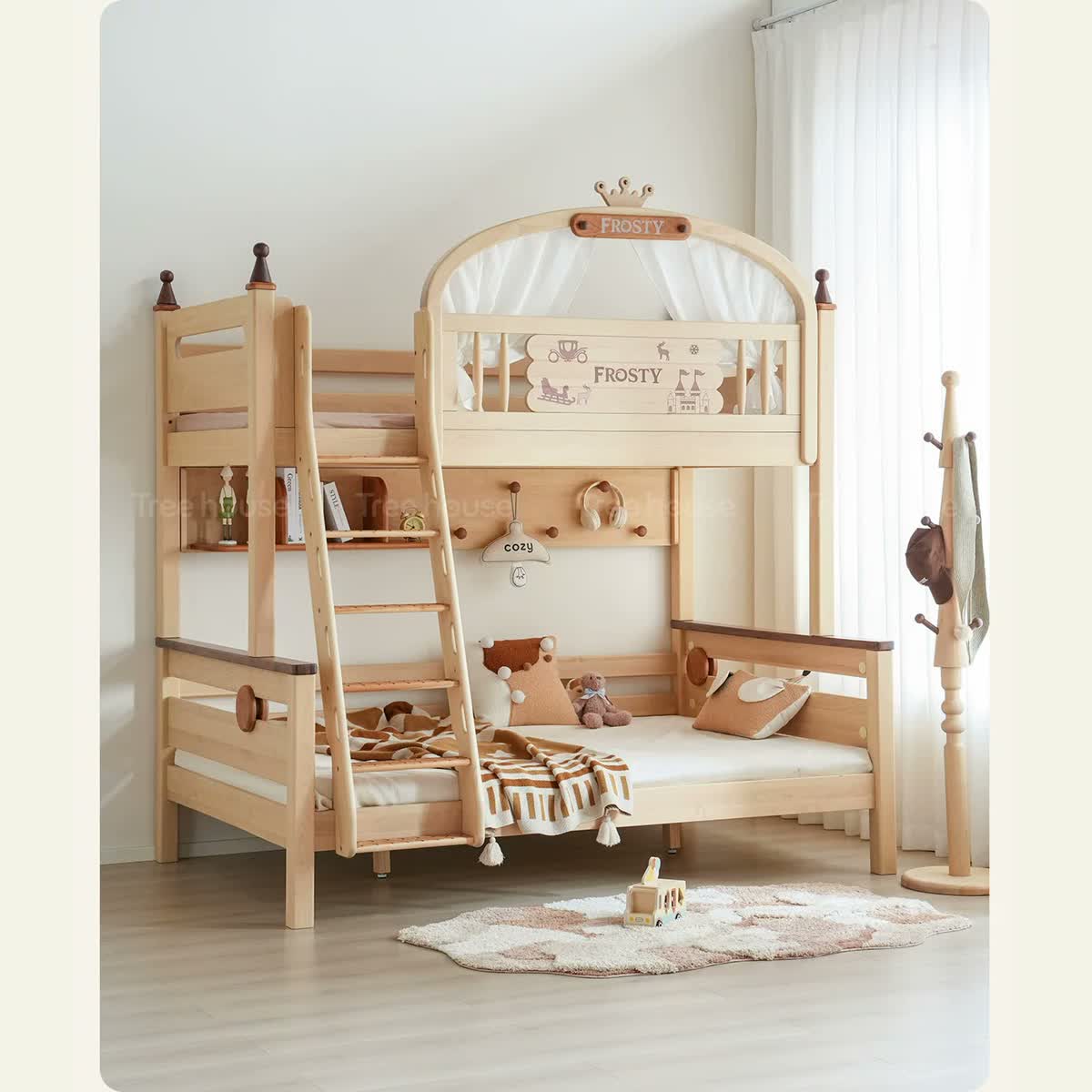 Crown-topped wood bunk bed styled with the optional bookshelf and peg panel.