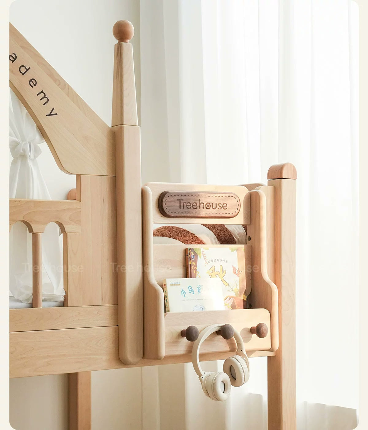  End-mounted book holder with wood pegs.