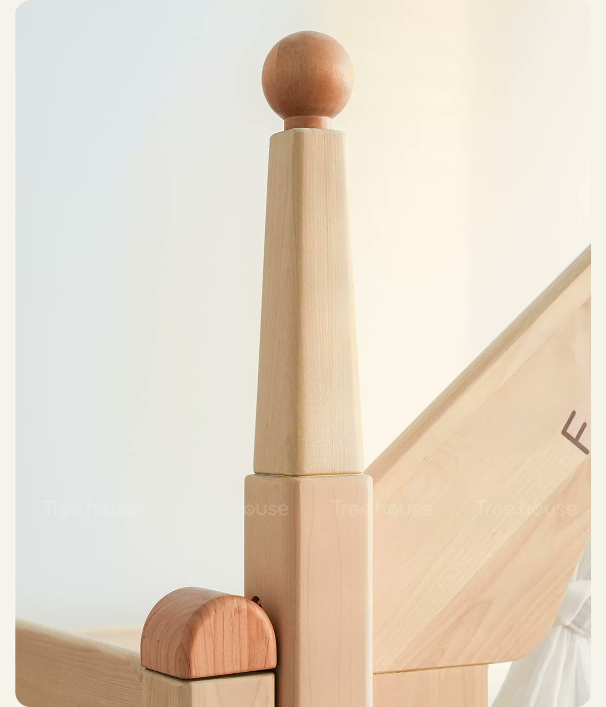  Rounded wood finial and corner detail.