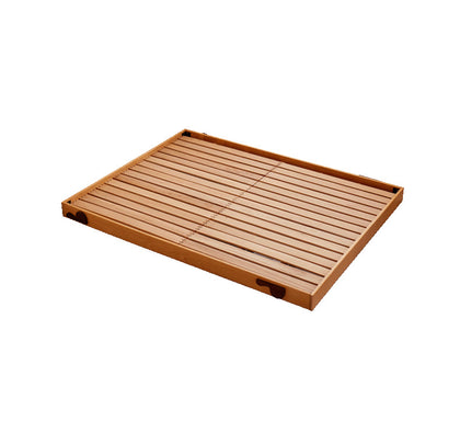  Bare wood slatted bed base in its low configuration.