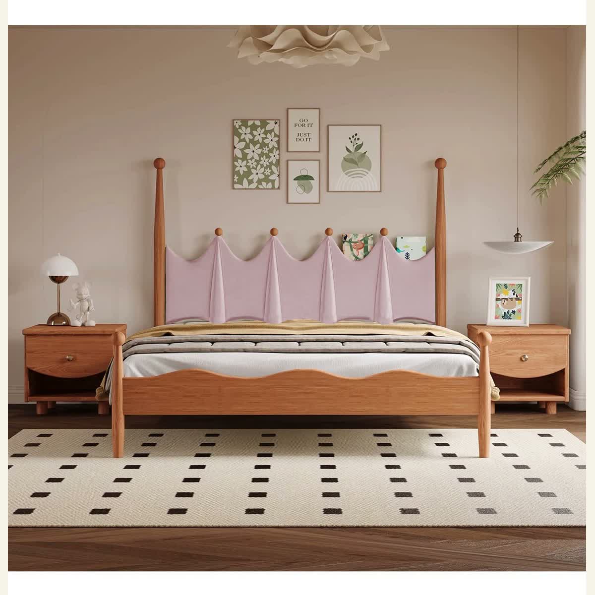 Pink scalloped upholstered bed with tall wood posts and curved footboard.